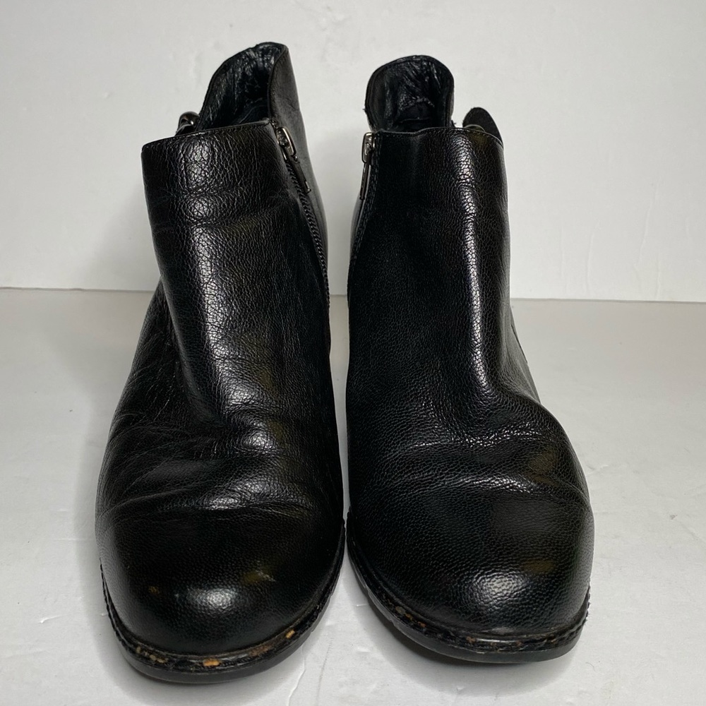 Clark’s black heeled boots with large buckle